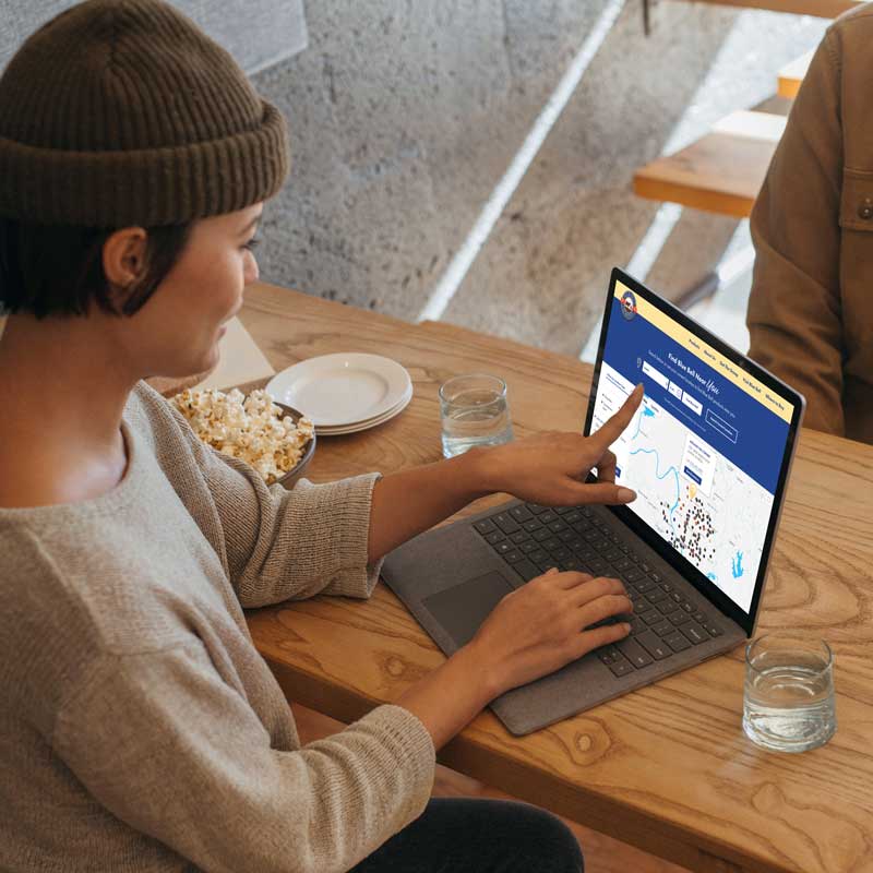 woman looking up Blue Bell locations using the website store finder